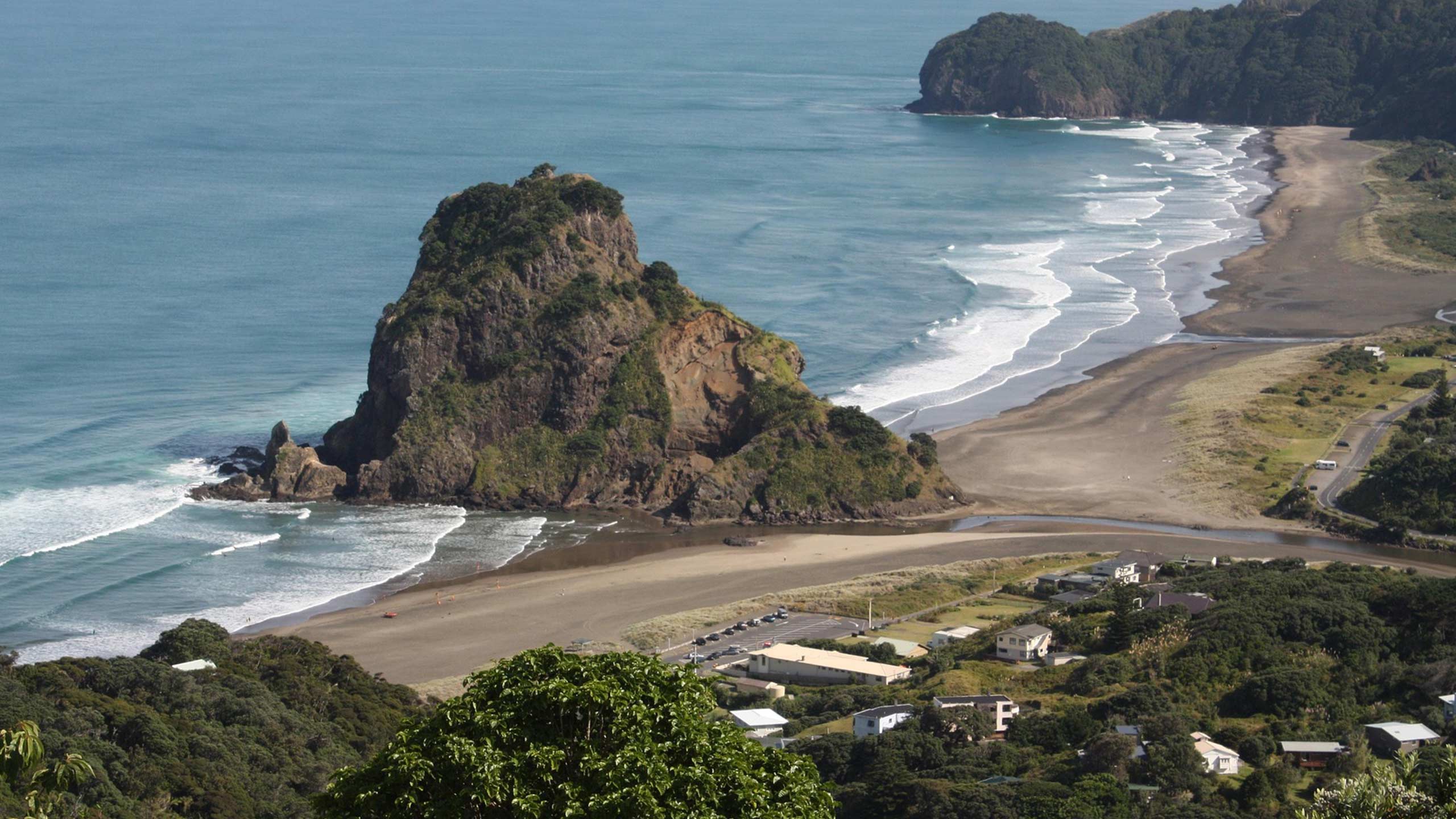 West-Auckland-Electricians A Picture of Piha Beach in West Auckland, highlgihting that we do work in West Auckland